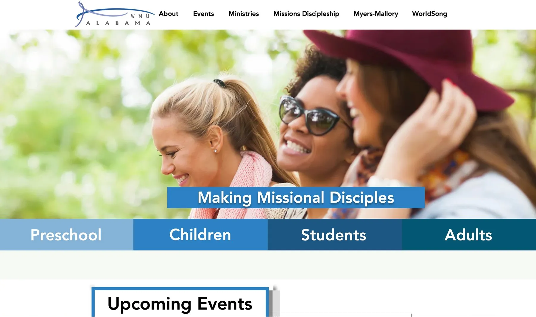 The redesigned Alabama WMU home page: a photo of three smiling women with the banner Making Missional Disciples.